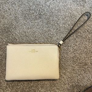 Mini white coach wristlet